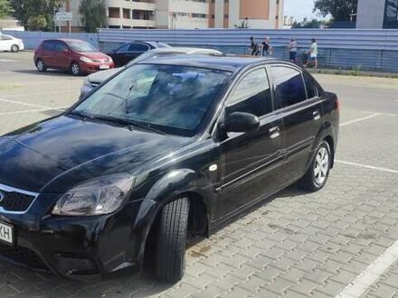 Черный Киа Рио, объемом двигателя 1.4 л и пробегом 224 тыс. км за 4600 $, фото 1 на Automoto.ua