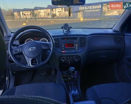 Черный Киа Рио, объемом двигателя 1.4 л и пробегом 270 тыс. км за 5000 $, фото 1 на Automoto.ua
