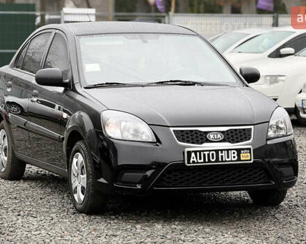 Черный Киа Рио, объемом двигателя 1.4 л и пробегом 100 тыс. км за 5000 $, фото 1 на Automoto.ua