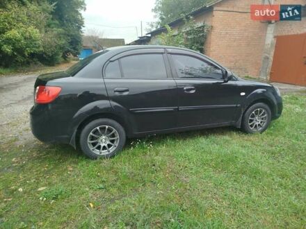 Черный Киа Рио, объемом двигателя 1.4 л и пробегом 133 тыс. км за 5900 $, фото 1 на Automoto.ua