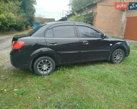Черный Киа Рио, объемом двигателя 1.4 л и пробегом 133 тыс. км за 5900 $, фото 1 на Automoto.ua