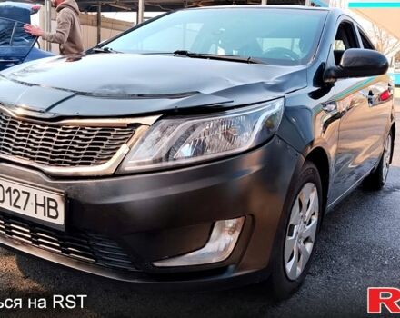 Черный Киа Рио, объемом двигателя 1.6 л и пробегом 173 тыс. км за 5800 $, фото 1 на Automoto.ua
