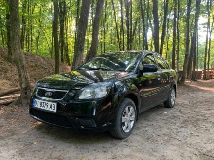 Чорний Кіа Ріо, об'ємом двигуна 1.4 л та пробігом 270 тис. км за 4499 $, фото 1 на Automoto.ua