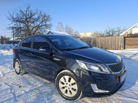 Черный Киа Рио, объемом двигателя 1.6 л и пробегом 231 тыс. км за 7400 $, фото 1 на Automoto.ua
