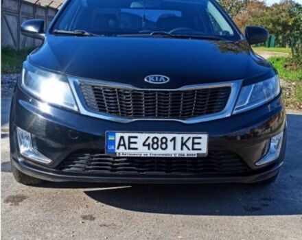 Черный Киа Рио, объемом двигателя 1.4 л и пробегом 160 тыс. км за 6900 $, фото 1 на Automoto.ua