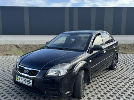 Черный Киа Рио, объемом двигателя 1.4 л и пробегом 208 тыс. км за 3900 $, фото 1 на Automoto.ua