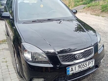 Чорний Кіа Ріо, об'ємом двигуна 1.4 л та пробігом 273 тис. км за 5700 $, фото 1 на Automoto.ua
