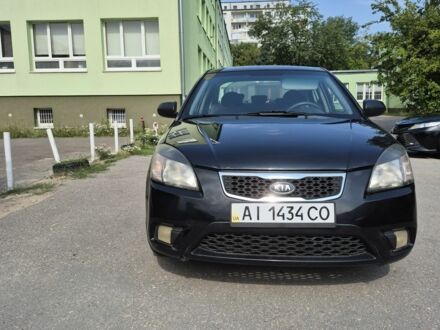 Чорний Кіа Ріо, об'ємом двигуна 1.4 л та пробігом 244 тис. км за 4718 $, фото 1 на Automoto.ua