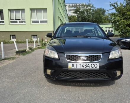 Чорний Кіа Ріо, об'ємом двигуна 1.4 л та пробігом 244 тис. км за 4718 $, фото 1 на Automoto.ua