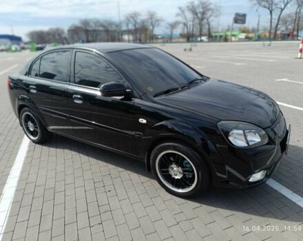 Чорний Кіа Ріо, об'ємом двигуна 1.4 л та пробігом 182 тис. км за 6500 $, фото 1 на Automoto.ua