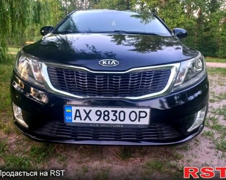 Чорний Кіа Ріо, об'ємом двигуна 1.6 л та пробігом 113 тис. км за 8500 $, фото 1 на Automoto.ua