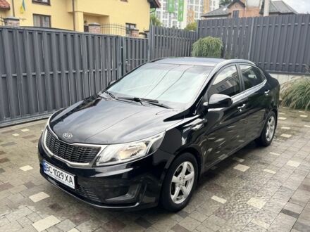 Черный Киа Рио, объемом двигателя 1.4 л и пробегом 199 тыс. км за 5999 $, фото 1 на Automoto.ua