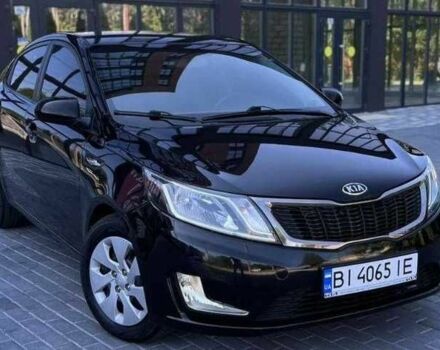 Черный Киа Рио, объемом двигателя 1.4 л и пробегом 100 тыс. км за 7607 $, фото 1 на Automoto.ua