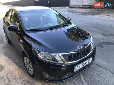 Чорний Кіа Ріо, об'ємом двигуна 1.4 л та пробігом 91 тис. км за 8500 $, фото 1 на Automoto.ua