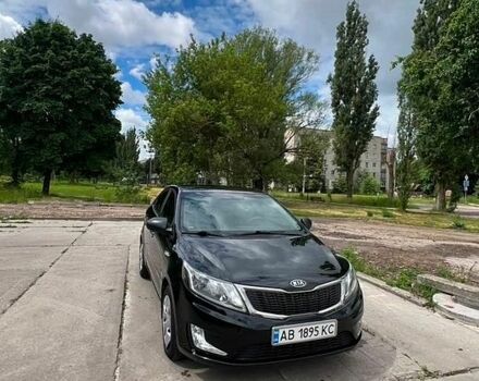 Чорний Кіа Ріо, об'ємом двигуна 1.4 л та пробігом 199 тис. км за 8800 $, фото 1 на Automoto.ua