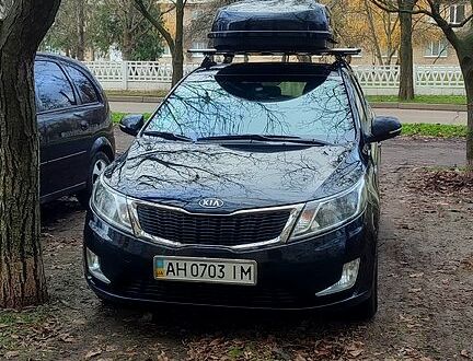 Чорний Кіа Ріо, об'ємом двигуна 1.6 л та пробігом 17600 тис. км за 7300 $, фото 1 на Automoto.ua