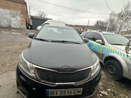 Черный Киа Рио, объемом двигателя 1.4 л и пробегом 100 тыс. км за 3500 $, фото 1 на Automoto.ua