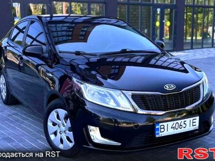 Чорний Кіа Ріо, об'ємом двигуна 1.4 л та пробігом 100 тис. км за 7600 $, фото 1 на Automoto.ua