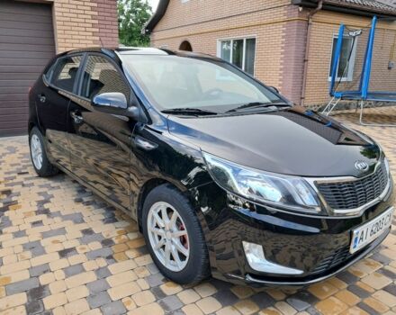 Чорний Кіа Ріо, об'ємом двигуна 1 л та пробігом 172 тис. км за 5516 $, фото 1 на Automoto.ua