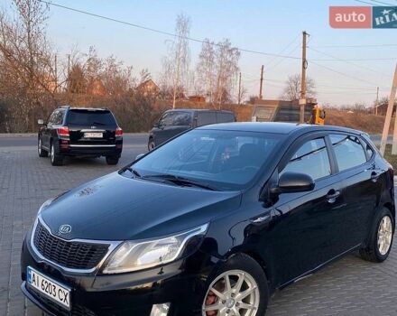 Черный Киа Рио, объемом двигателя 1.4 л и пробегом 170 тыс. км за 6700 $, фото 1 на Automoto.ua