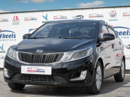 Чорний Кіа Ріо, об'ємом двигуна 1.6 л та пробігом 144 тис. км за 9500 $, фото 1 на Automoto.ua