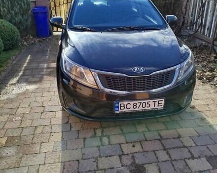 Чорний Кіа Ріо, об'ємом двигуна 1.4 л та пробігом 95 тис. км за 7000 $, фото 1 на Automoto.ua