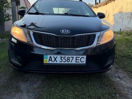 Черный Киа Рио, объемом двигателя 1.4 л и пробегом 73 тыс. км за 8900 $, фото 1 на Automoto.ua