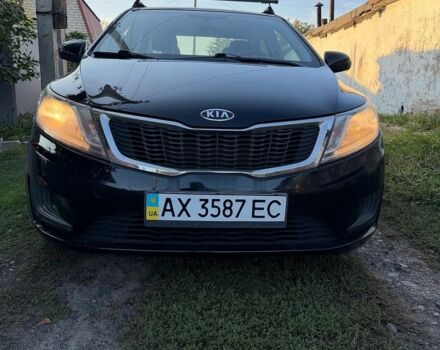 Чорний Кіа Ріо, об'ємом двигуна 1.4 л та пробігом 73 тис. км за 8900 $, фото 1 на Automoto.ua