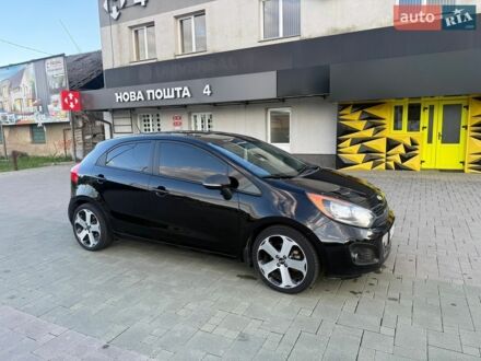 Черный Киа Рио, объемом двигателя 1.59 л и пробегом 128 тыс. км за 5500 $, фото 1 на Automoto.ua