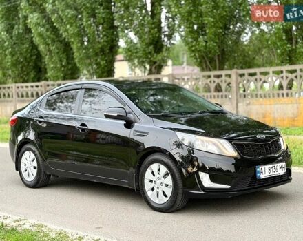Черный Киа Рио, объемом двигателя 1.59 л и пробегом 132 тыс. км за 8999 $, фото 1 на Automoto.ua