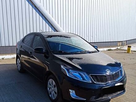 Чорний Кіа Ріо, об'ємом двигуна 1.4 л та пробігом 125 тис. км за 6700 $, фото 1 на Automoto.ua