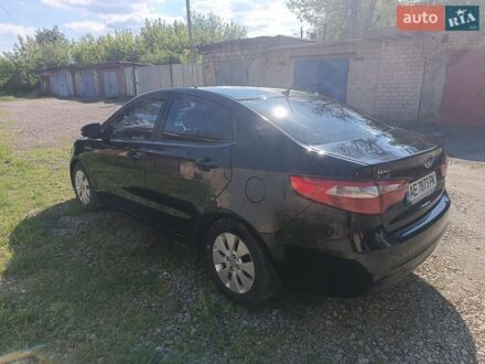 Черный Киа Рио, объемом двигателя 1.59 л и пробегом 184 тыс. км за 8000 $, фото 1 на Automoto.ua