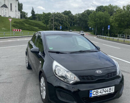 Черный Киа Рио, объемом двигателя 1.2 л и пробегом 200 тыс. км за 5700 $, фото 1 на Automoto.ua
