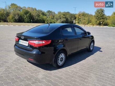 Черный Киа Рио, объемом двигателя 1.4 л и пробегом 113 тыс. км за 6900 $, фото 1 на Automoto.ua