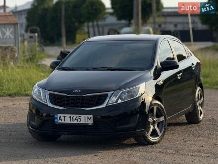 Черный Киа Рио, объемом двигателя 1.4 л и пробегом 99 тыс. км за 7750 $, фото 1 на Automoto.ua