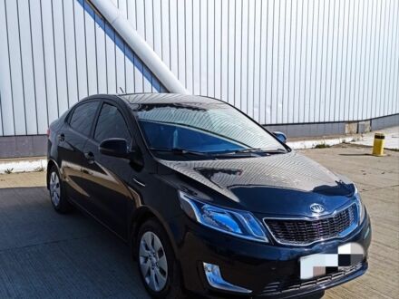Чорний Кіа Ріо, об'ємом двигуна 1 л та пробігом 125 тис. км за 6700 $, фото 1 на Automoto.ua