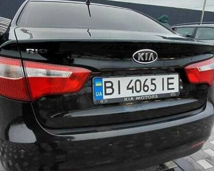 Чорний Кіа Ріо, об'ємом двигуна 1.4 л та пробігом 100 тис. км за 7607 $, фото 1 на Automoto.ua