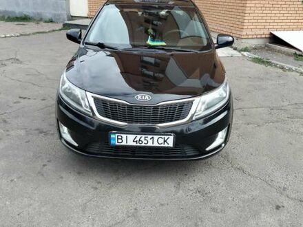Чорний Кіа Ріо, об'ємом двигуна 1.4 л та пробігом 123 тис. км за 7600 $, фото 1 на Automoto.ua
