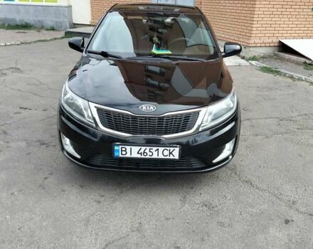 Чорний Кіа Ріо, об'ємом двигуна 1.4 л та пробігом 123 тис. км за 7600 $, фото 1 на Automoto.ua