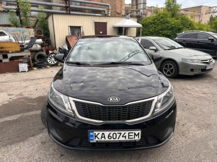 Чорний Кіа Ріо, об'ємом двигуна 1.4 л та пробігом 230 тис. км за 5500 $, фото 1 на Automoto.ua