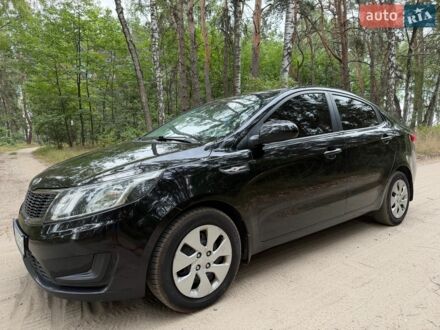 Чорний Кіа Ріо, об'ємом двигуна 1.4 л та пробігом 193 тис. км за 6300 $, фото 1 на Automoto.ua
