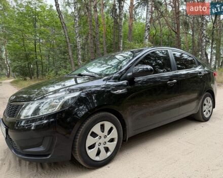 Черный Киа Рио, объемом двигателя 1.4 л и пробегом 193 тыс. км за 6300 $, фото 1 на Automoto.ua