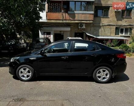 Чорний Кіа Ріо, об'ємом двигуна 1.4 л та пробігом 124 тис. км за 6300 $, фото 1 на Automoto.ua