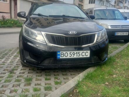 Чорний Кіа Ріо, об'ємом двигуна 1.4 л та пробігом 213 тис. км за 7999 $, фото 1 на Automoto.ua
