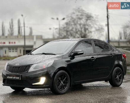 Черный Киа Рио, объемом двигателя 1.6 л и пробегом 231 тыс. км за 7999 $, фото 1 на Automoto.ua