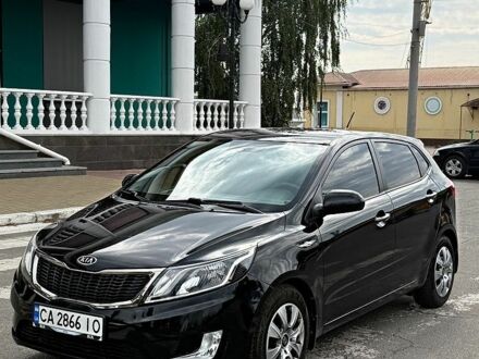Чорний Кіа Ріо, об'ємом двигуна 1.59 л та пробігом 127 тис. км за 7600 $, фото 1 на Automoto.ua