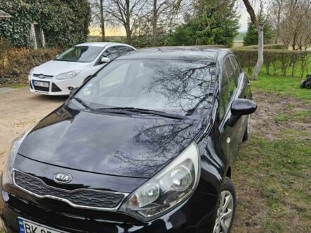 Чорний Кіа Ріо, об'ємом двигуна 1.1 л та пробігом 143 тис. км за 6830 $, фото 1 на Automoto.ua