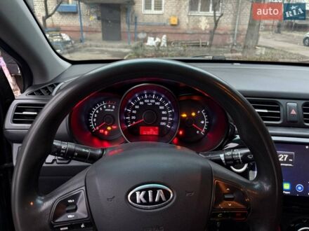 Чорний Кіа Ріо, об'ємом двигуна 1.4 л та пробігом 154 тис. км за 7200 $, фото 1 на Automoto.ua