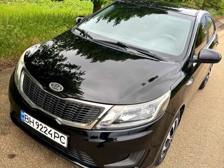 Черный Киа Рио, объемом двигателя 1.4 л и пробегом 131 тыс. км за 7500 $, фото 1 на Automoto.ua