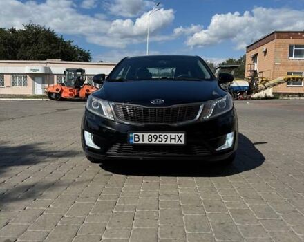 Чорний Кіа Ріо, об'ємом двигуна 1.4 л та пробігом 158 тис. км за 8300 $, фото 1 на Automoto.ua
